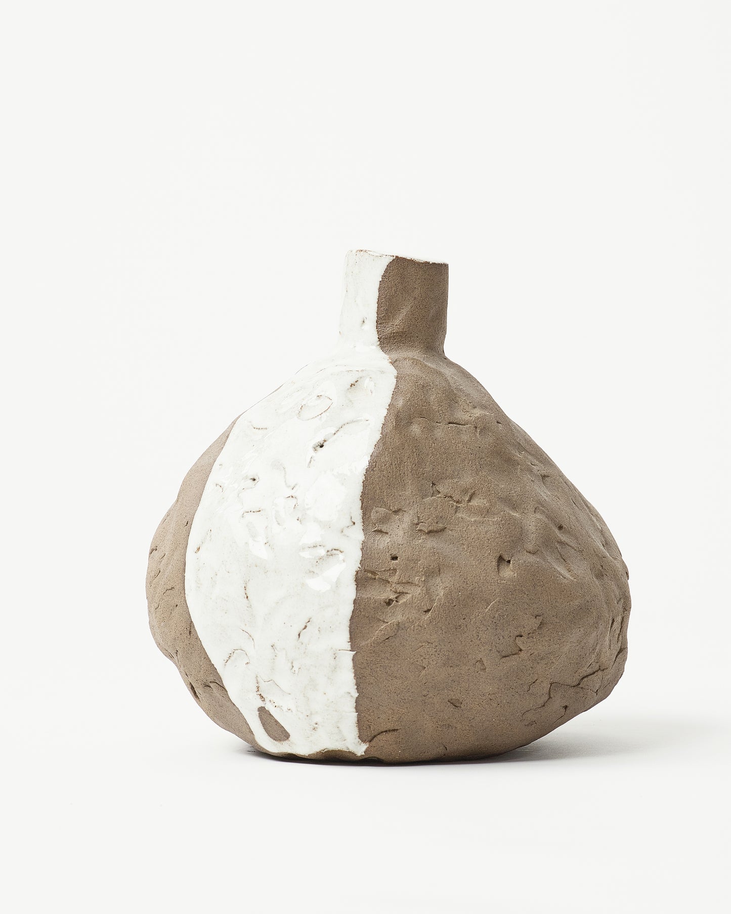 Hand made ceramic art with white detail curated by Rezort