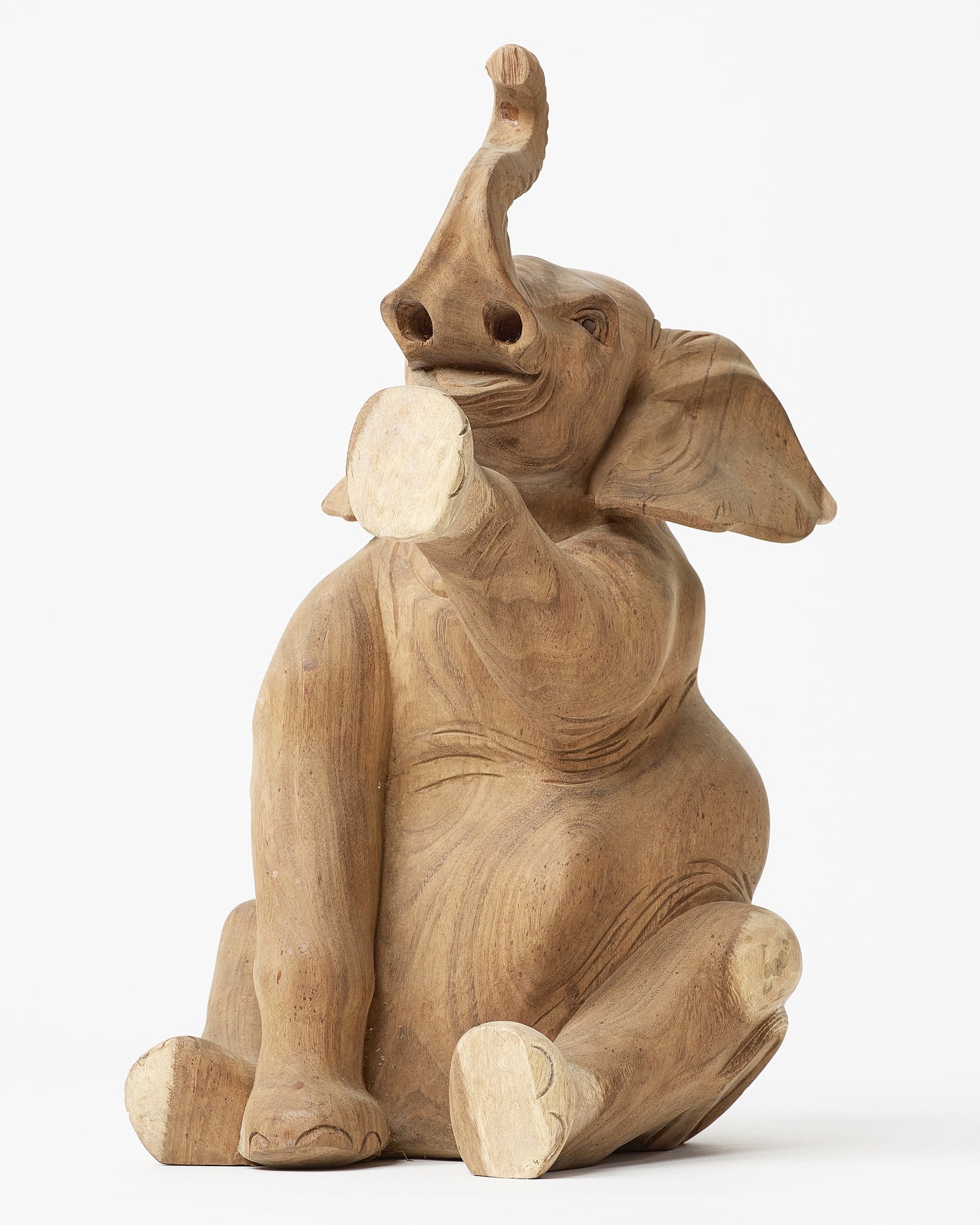 Graceful Elephant Figurine with Raised Trunk and Paw