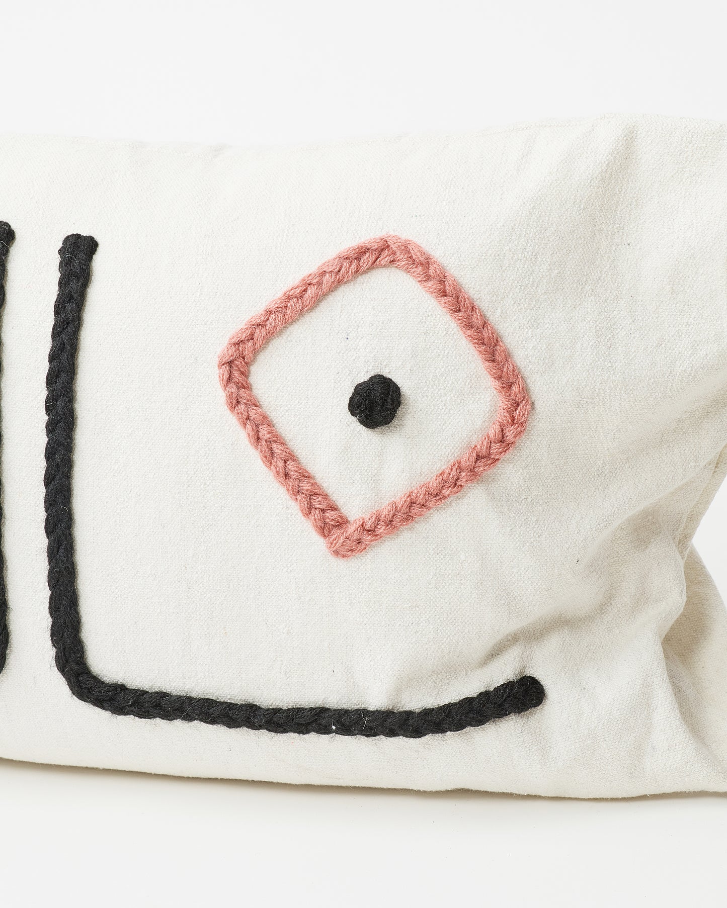 Eccentric Rectangular Pillow with Embroidered Eyes and Nose